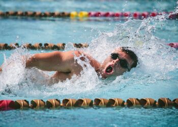 Why is a giant transgender swimmer competing against women?