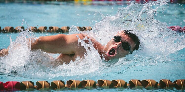 Why is a giant transgender swimmer competing against women?